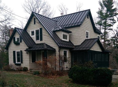 dark bronze metal roof white house|white house black roof pictures.